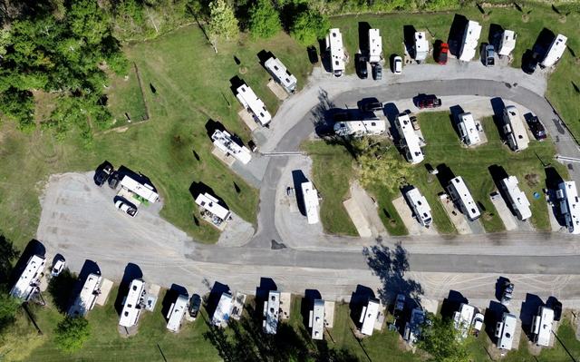 Overhead aerial view of Rustic Oak RV Park with RVs around paved loops